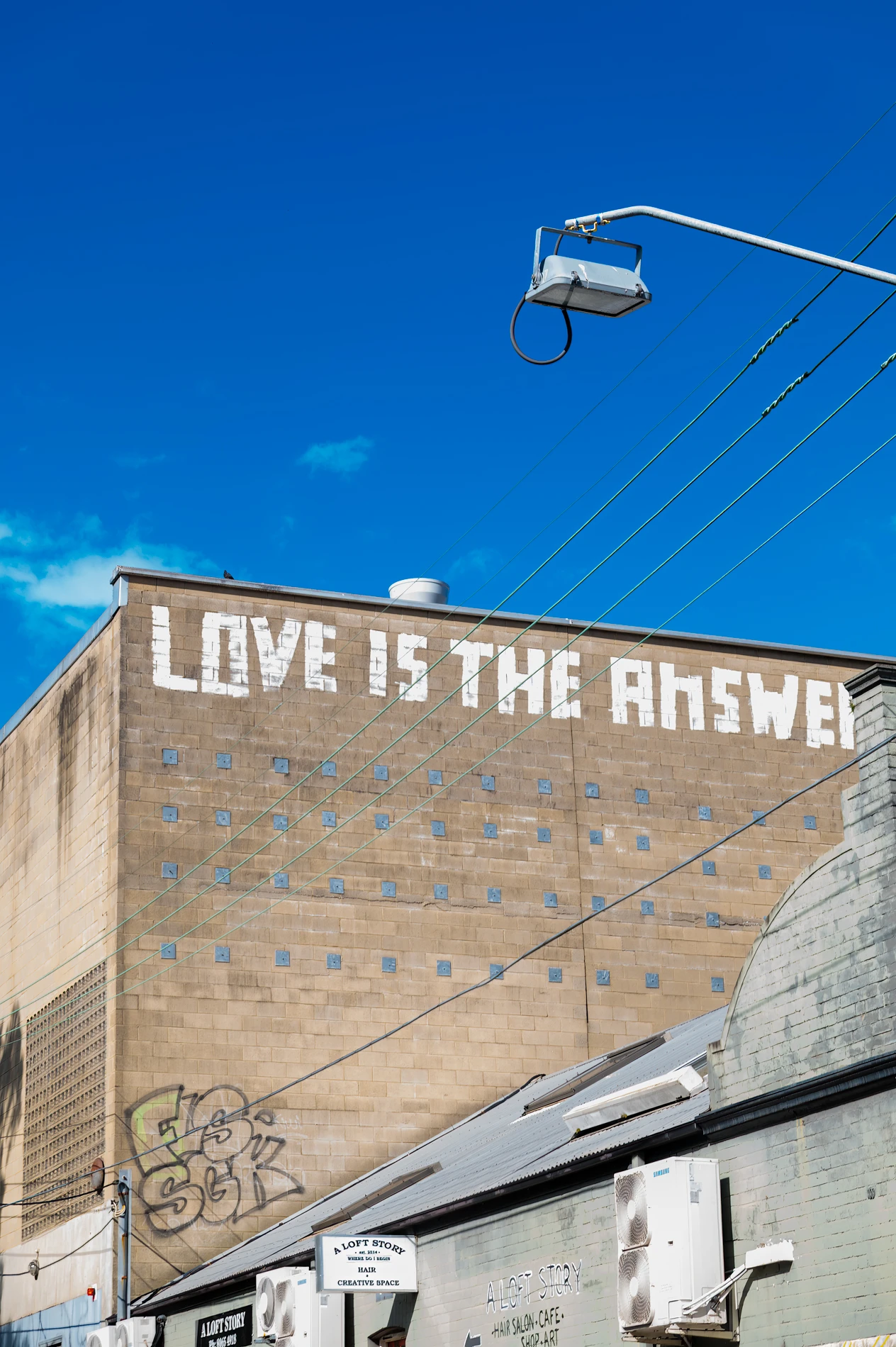 Galleries Newtown Love Is The Answer Graffiti On Brick