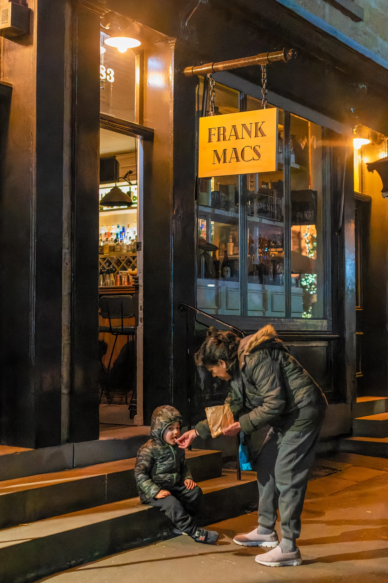 Galleries Vivid Mother Feeding Son Outside Store Frank Macs