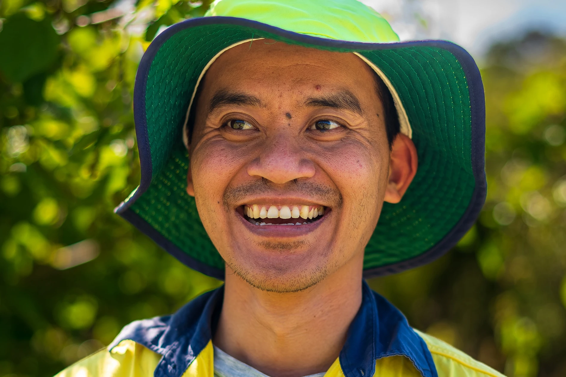 Portfolio 13 Smiling Person Yellow Green Hat Outdoors
